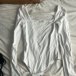 White long sleeve Babaton Bodysuit Aritzia